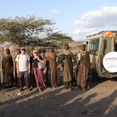 Ahambi Tours guests meeting Turkana women during a cultural visit on a 10-Day Northern Kenya Safari